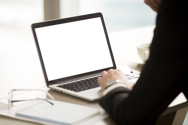 istock Businessman using pc laptop, mock up blank screen, close up 858510658