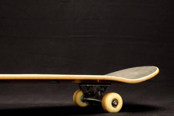 istock Old Used Wooden Skateboard 858515348