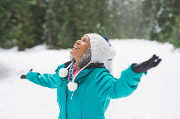 snowshoeing adventure! - senior adult cheerful adventure discovery imagens e fotografias de stock