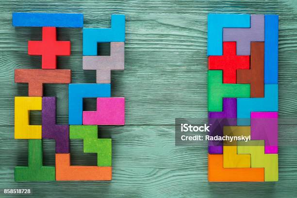 Logical Tasks Composed Of Colorful Wooden Shapes Business Concept Stock Photo - Download Image Now