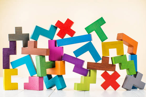 istock Background with multicolored shapes wooden blocks. 858518760