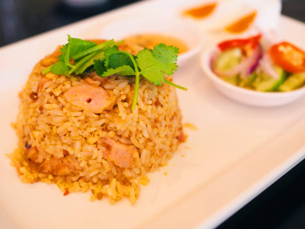 istock Thai stir fried rice with Satay pork, close up perspective 858519320