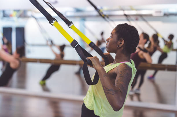 istock Group of Women Doing TRX Workout 858519550