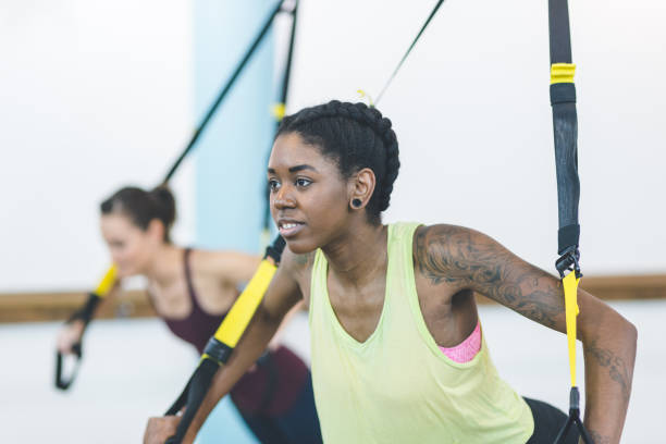 istock Group of Women Doing TRX Workout 858519604