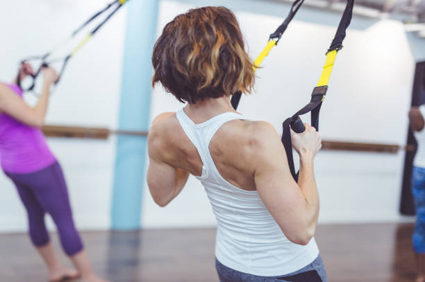 istock Group of Women Doing TRX Workout 858519616