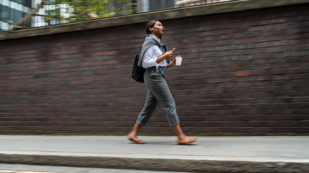 istock Businesswoman is thinking about meeting while walking 858525920