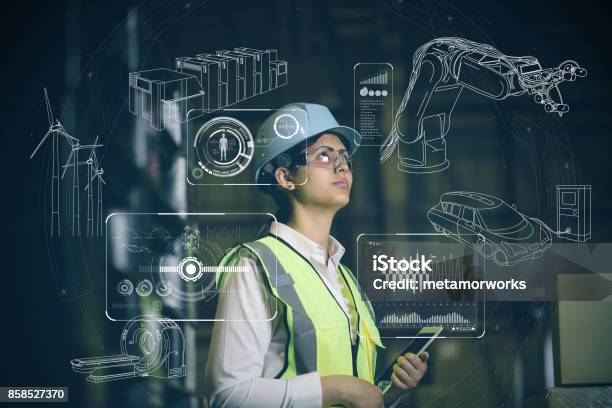 Woman Engineer And Various Business Information Stock Photo - Download Image Now - Engineer, Manufacturing, Graph