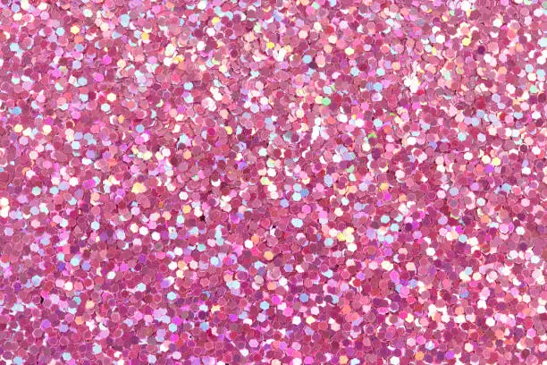 Pink bright glitter texture. High resolution photo.