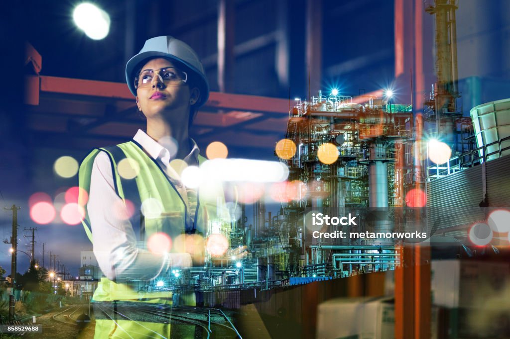 double exposure of woman labor and factory exterior. industrial technology concept. Engineer Stock Photo