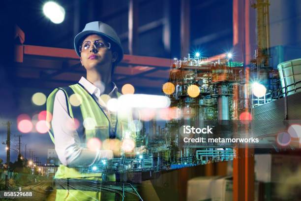 Double Exposure Of Woman Labor And Factory Exterior Industrial Technology Concept Stock Photo - Download Image Now