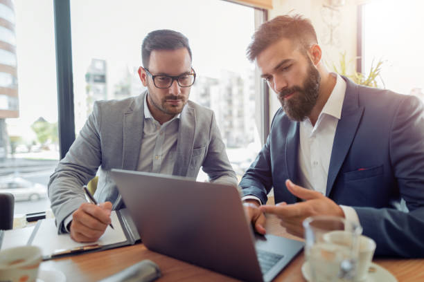istock Two businessmen are working in office 858530898