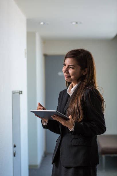 istock Woman working at hotel 858534520