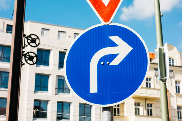istock blue traffic sign with white arrow 858534794