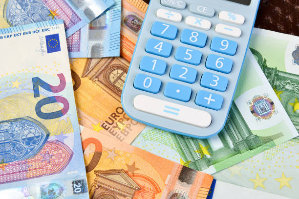 istock money and calculator 858540888