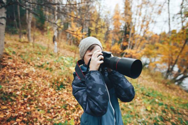 istock Teenager Boy with Camera 858541300