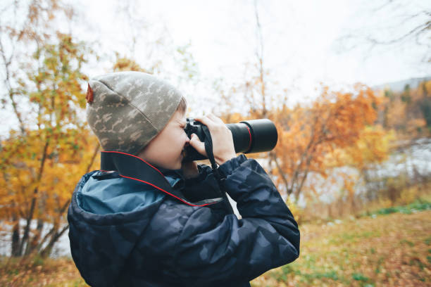 istock Teenager Boy with Camera 858541394