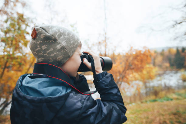 istock Teenager Boy with Camera 858541400