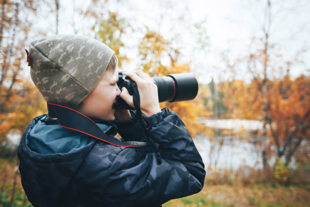 istock Teenager Boy with Camera 858541416