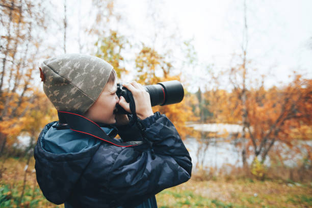 istock Teenager Boy with Camera 858541418