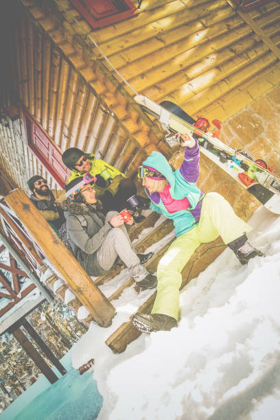 istock Four people taking selfie before skiing and snowboarding 858544788