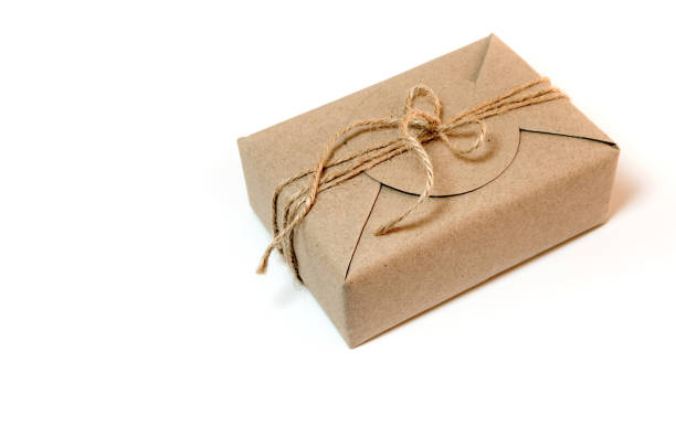 istock Gift box wrapped in kraft paper and rustic hemp as natural rustic style 858545076