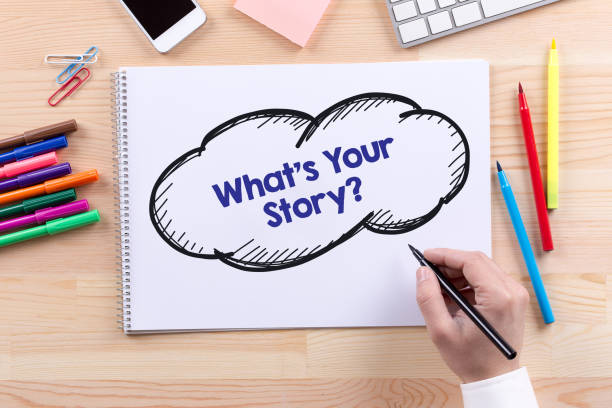 istock Man with a Notepad written What's Your Story? Concept 858546742
