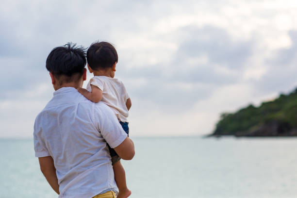 istock Family at the beach 858549792