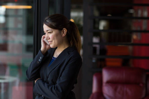 istock A woman talking on the phone 858549936