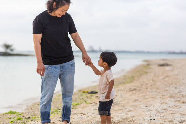 istock Family at the beach 858550130