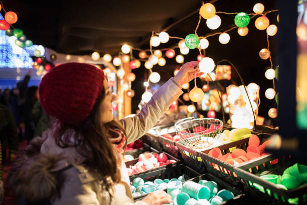 Woman on the festive Christmas market stock photo