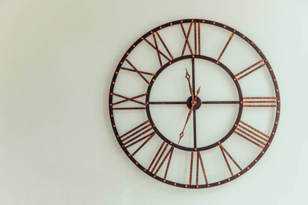 istock Old Clock made of wrought iron wall 858557960