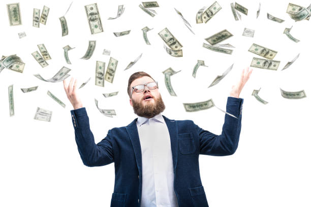 istock businessman with dollar banknotes 858560526