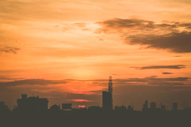 istock climate sunset sky with fluffy clouds and beautiful heavy weather landscape 858561760