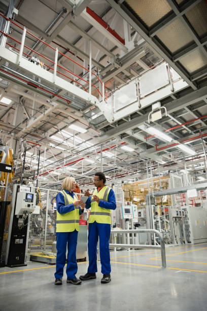 istock Two Factory Surveyors 858565074