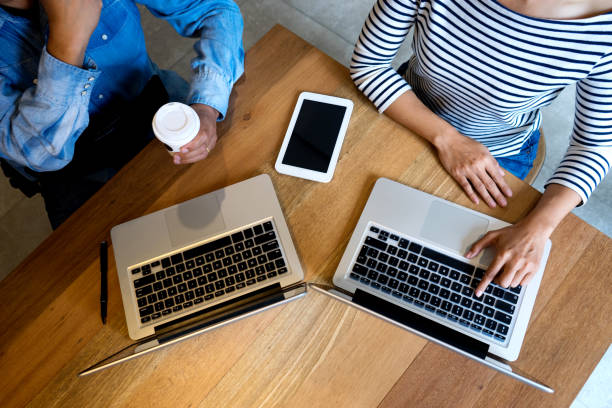istock business team man and woman work  on wood table 858569048