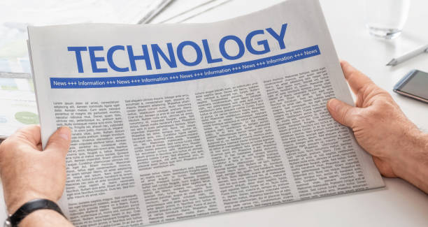 istock Man reading newspaper with the headline Technology 858579116