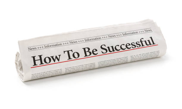 istock Rolled newspaper with the headline How to be successful 858579308