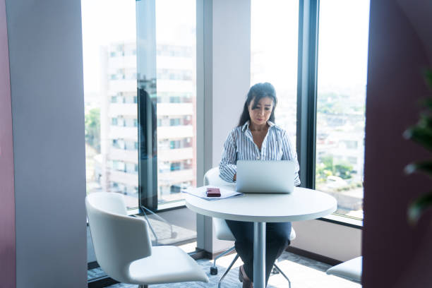 istock A woman working at office 858586840
