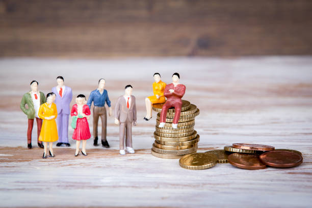 istock Making money, selling and competing. Colorful Human miniatures 858587226