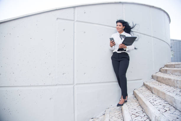 istock Cheerful business lady always connectable 858587668