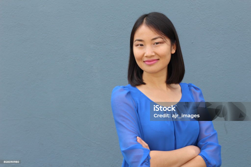 Determined looking Asian working woman Determined looking Asian working woman. Women Stock Photo