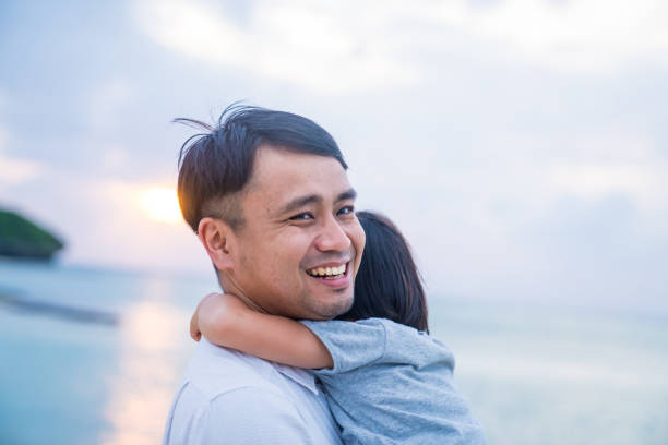 istock Family at the beach 858591242