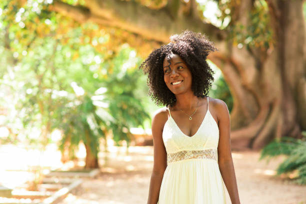 istock Happy Attractive Black Woman Walking in Park 858591392