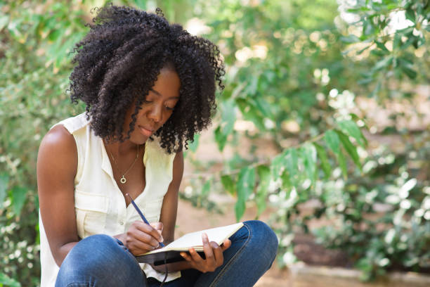 istock Serious Young Black Woman Working in Park 858591486