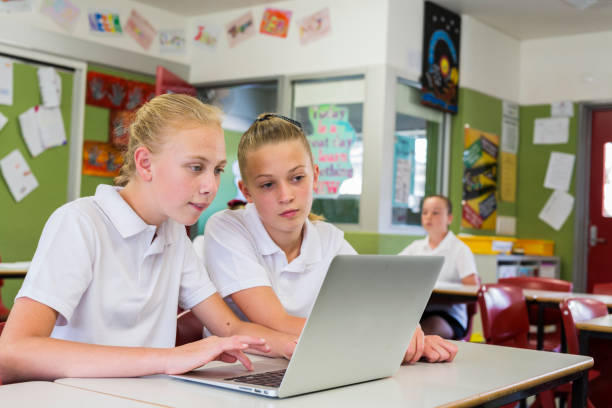 istock Education of Junior High School Girl Students Using Computers 858591604