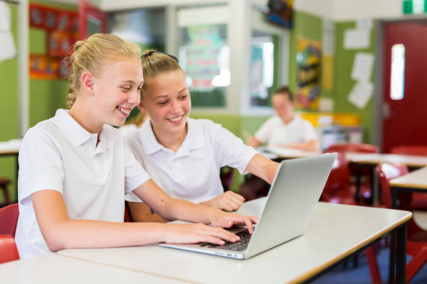 istock Education of Junior High School Girl Students Using Computers 858591606