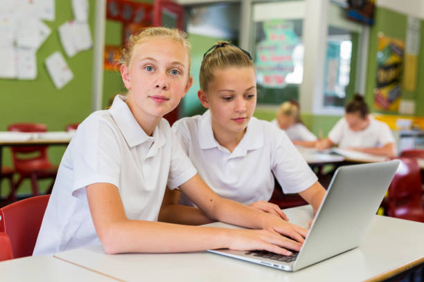 istock Education of Junior High School Girl Students Using Computers 858591610