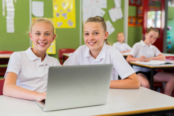 istock Education of Junior High School Girl Students Using Computers 858591624