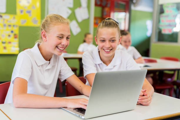 Education of Junior High School Girl Students Using Computers stock photo