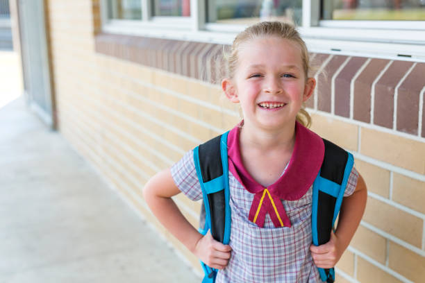 istock Kindergarten Primary School Girl Student Arriving for Class 858591640